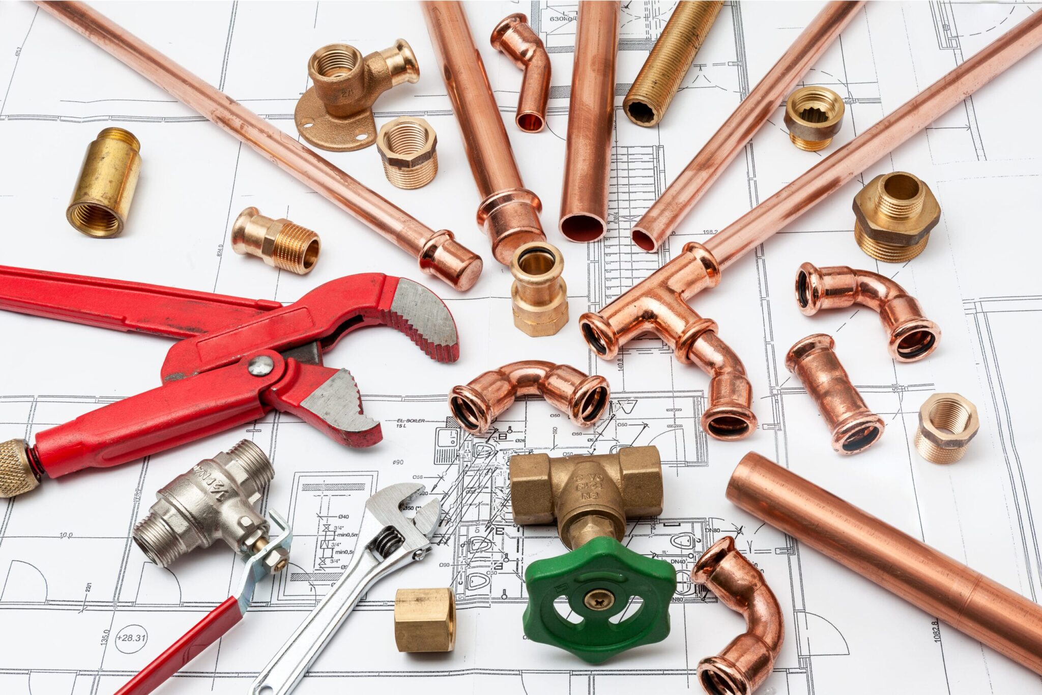 Copper pipes, fittings, valves, and plumbing tools in Redmond